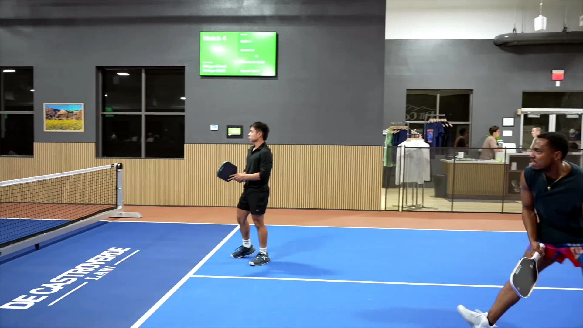 Competitive indoor pickleball play at The Courts LV